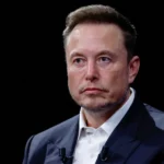 Elon Musk AI timeline graphic showing a four-year countdown beside AI model benchmarks and safety warning symbols